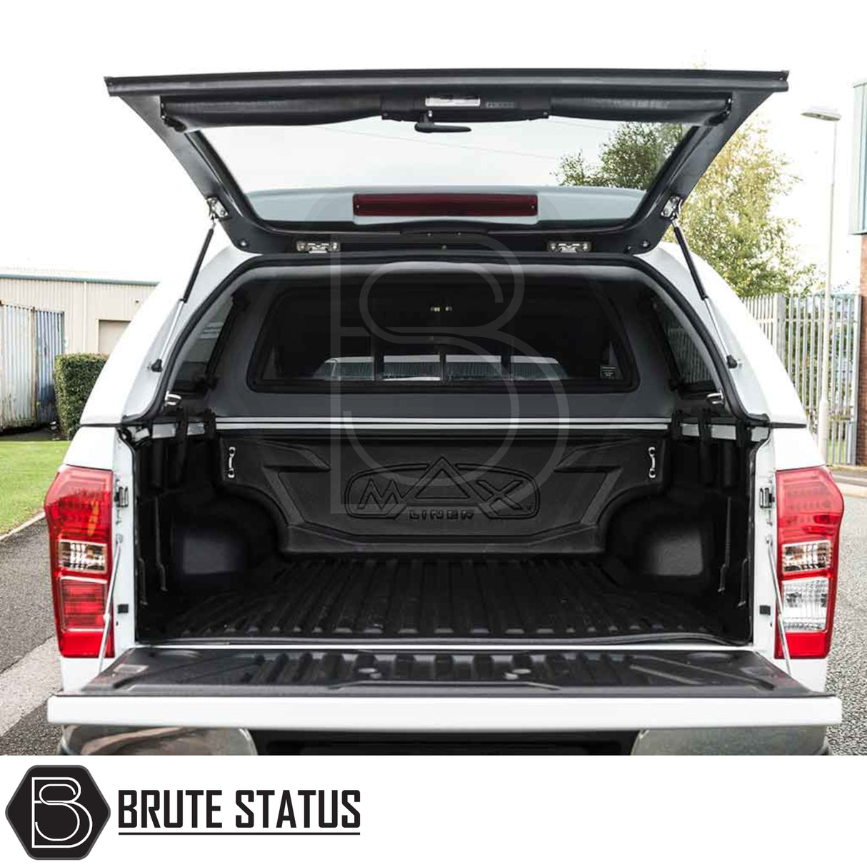Isuzu D-Max 2012-2021 Truckman Grand Hardtop Canopy with remote locking; white pickup, open tailgate, MAXLiner bed liner, and lifted hard-shell canopy.