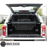 Isuzu D-Max 2012-2021 Truckman Grand Hardtop Canopy with remote locking; white pickup, open tailgate, MAXLiner bed liner, and lifted hard-shell canopy.