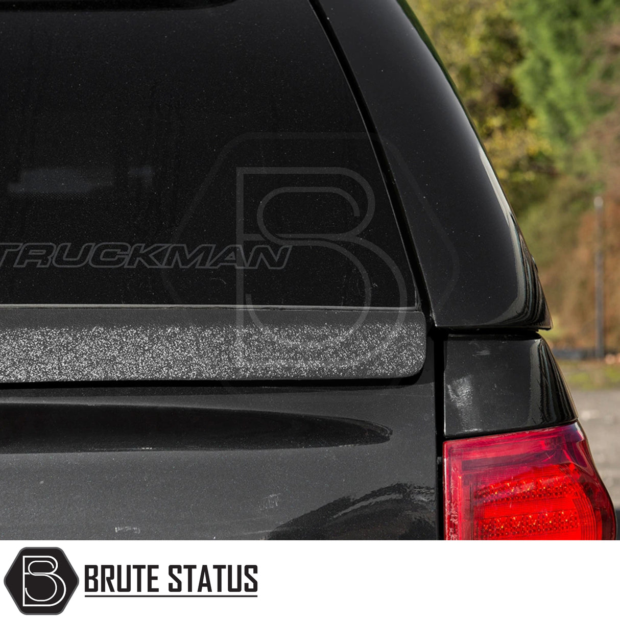 Isuzu D-Max 2012-2021 Truckman Grand Hardtop Canopy with Brute Status logo, showcasing a tinted rear window and right-hand tail lamp.