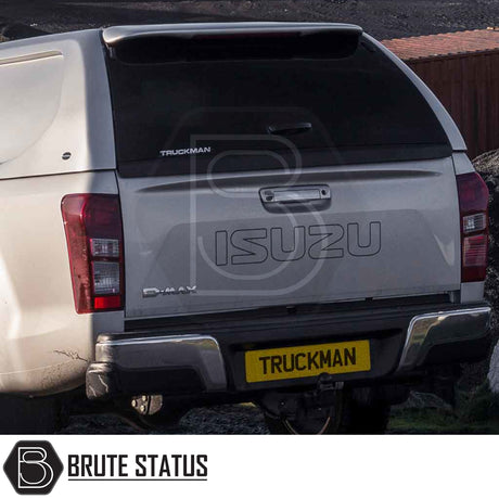 Rear view of a silver Isuzu D-Max with Truckman L-Series Hardtop Canopy, featuring remote locking, solid sides, and stylish integration for enhanced security and functionality.