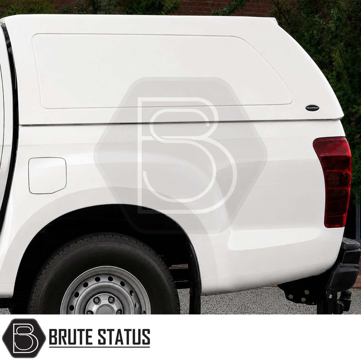 Solid-sided Isuzu D-Max commercial canopy with glazed rear window and clamp-fit installation system