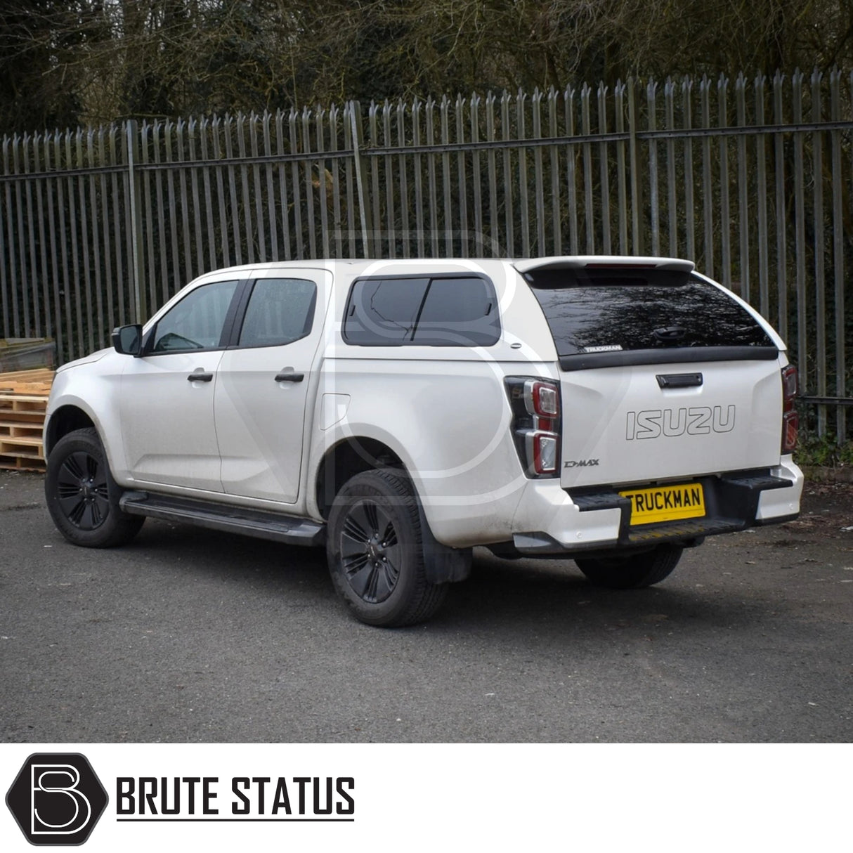 Isuzu D-Max Truckman GLS Hardtop Canopy with remote locking, featuring tinted windows and a vinyl-lined interior, parked on a paved surface.