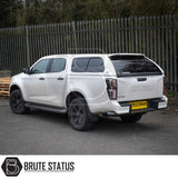 Isuzu D-Max Truckman GLS Hardtop Canopy with remote locking, featuring tinted windows and a vinyl-lined interior, parked on a paved surface.