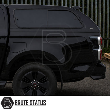 Cab-high Truckman Grand hardtop for Isuzu D-Max with tinted frameless windows and extra storage space