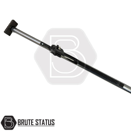 Galvanised cargo load bar with rubberised end pads and quick-adjust ratchet mechanism for secure load restraint