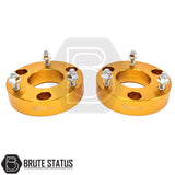 Front shock spacer lift kit for Mitsubishi L200, 32mm spacers forged from 6061-T6 aluminium with anodised finish, featuring pre-installed grade 10.9 steel studs and nuts, designed to provide approximately 2–2.5 inch suspension lift when paired with rear shackles, ready to fit.