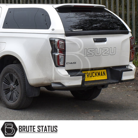 Maxus T90EV 2022+ Truckman Grand Hardtop Canopy with remote locking, shown on a white Isuzu D-Max, featuring tinted windows and black alloy wheels.