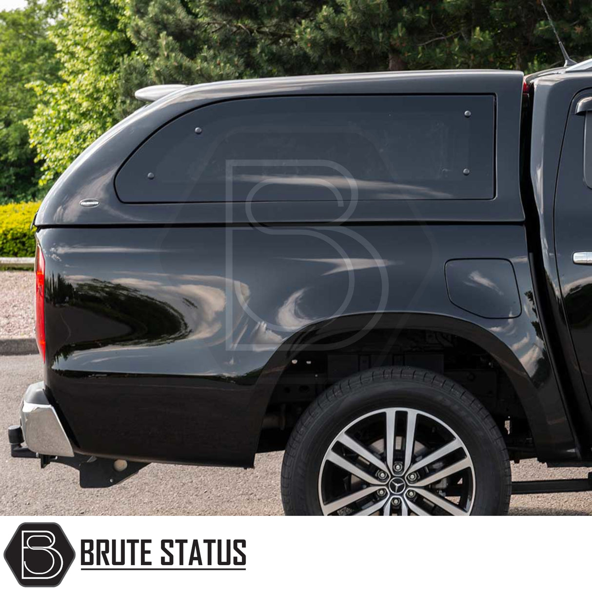 Mercedes X-Class 2017-2020 Truckman Grand Hardtop Canopy with remote locking, shown on a black pickup, features sleek design, integrated side window, multi-spoke alloy wheels.