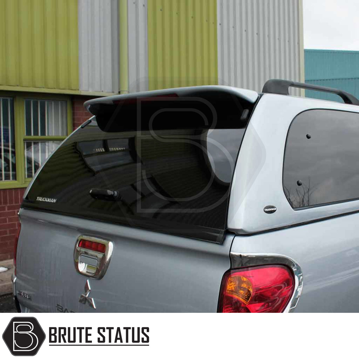 Mitsubishi L200 2010-2015 Series 4 Truckman Grand Hardtop Canopy with tinted windows, spoiler, and remote locking, enhancing style and functionality.