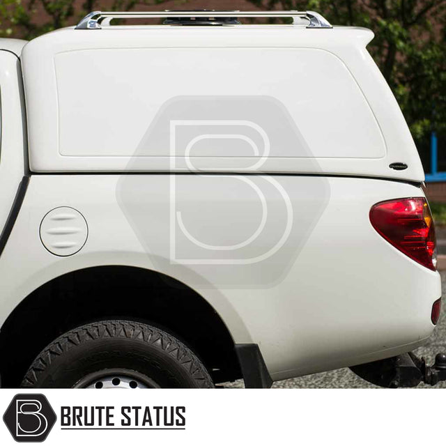 Mitsubishi L200 2010-2015 Series 4 Long Bed Truckman RS Hardtop Canopy with glazed rear window, solid sides, roof rails, and tow hitch visible.