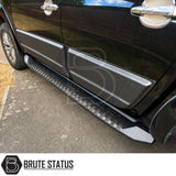 Matte Black heavy duty side panel protection fitted to Mitsubishi L200 Series 5 model pickup truck offroad 4x4 vehicle. Suitable for overlanding set ups, mounting hardware and brackets included. 