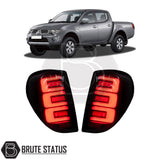 Mitsubishi L200 Series 4 MK4 aftermarket LED tail lights matching pair with sequential indicators clear lenses black housing and plug and play OEM connectors