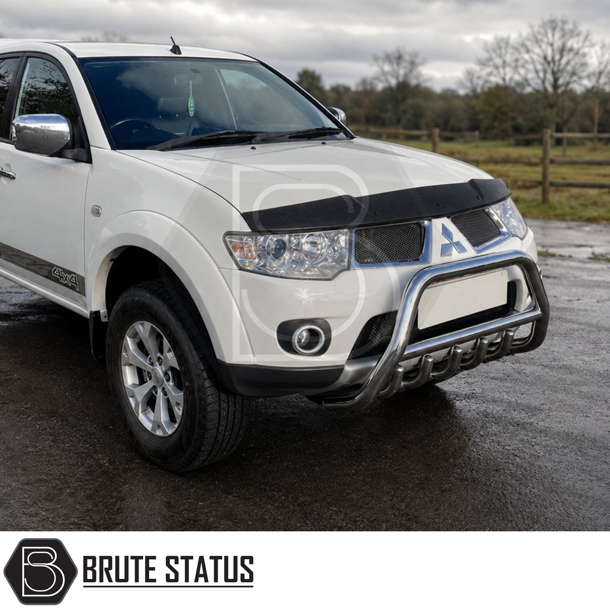 Front mounting heavy duty carbon stainless chrome steel nudge bull bar fitted to Mitsubishi L200 Series 4 pickup truck offroad 4x4. 