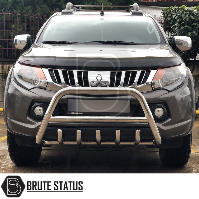 Mitsubishi L200 Series 5 2015-2019 A-Fitted Bar (Nudge Bar) Polished, enhancing bumper protection and style, visible on parked vehicle.