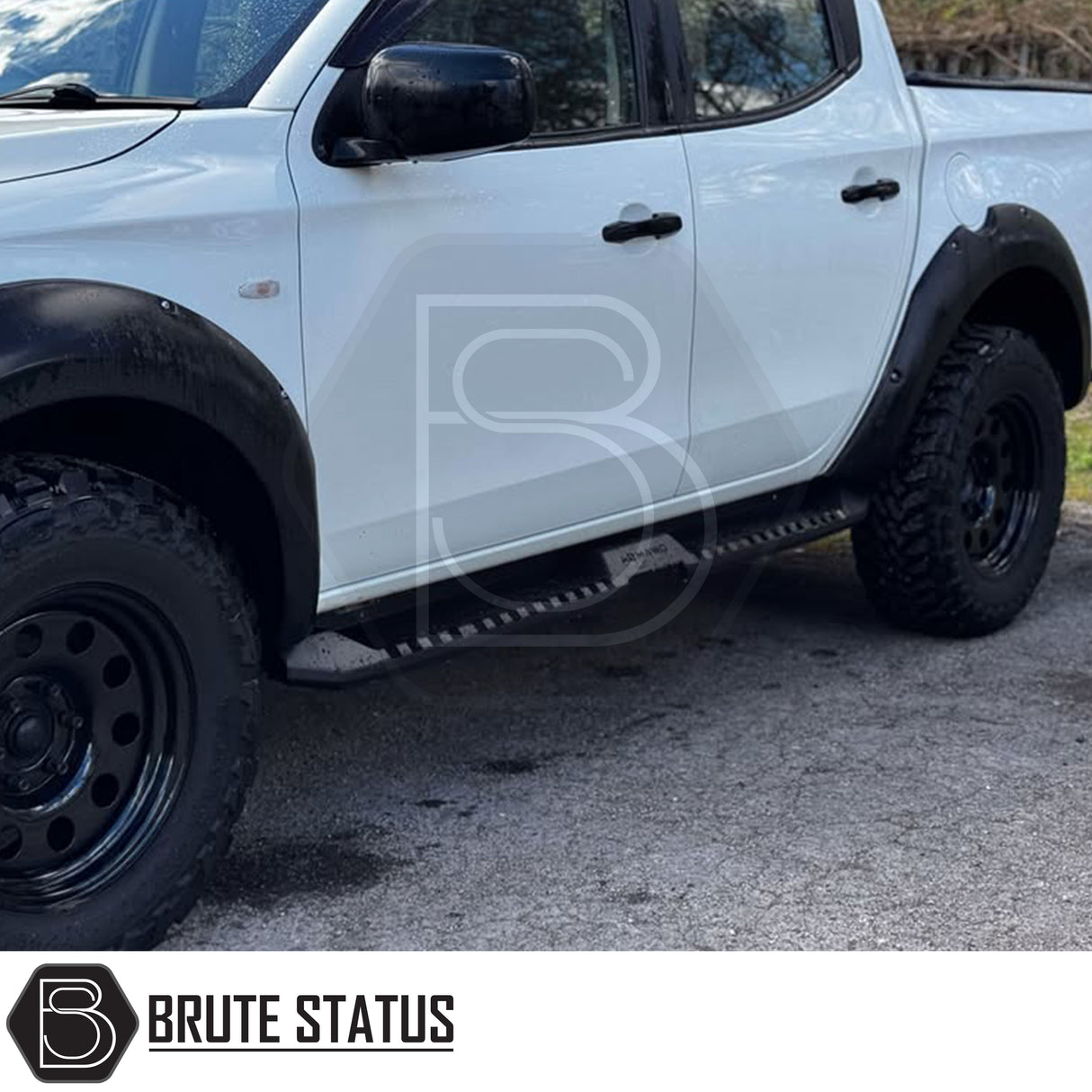 Mitsubishi L200 Series 5 2015-2019 Heavy Duty S32 Steel Side Steps in matt black, shown installed on a parked vehicle, highlighting durability and design.