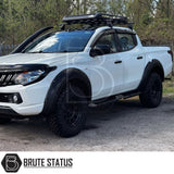 Mitsubishi L200 Series 5 2015-2019 Heavy Duty S32 Steel Side Steps in matt black, shown installed on a parked vehicle, highlighting durability and design.