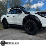 Mitsubishi L200 Series 5 2015-2019 Heavy Duty S32 Steel Side Steps in matt black, shown installed on a parked vehicle, highlighting durability and design.