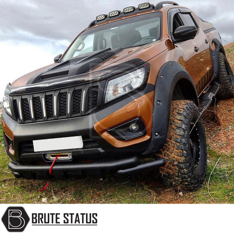 Nissan Navara NP300 2015-2022 Bonnet Scoop on a vehicle, showcasing its aggressive design and smooth black finish, ideal for enhancing your pick-up truck's style.