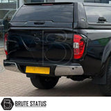 Chrome rear bumper for Nissan Navara NP300 (2015–2022), featuring a sleek factory-style finish, pre-drilled holes for OEM parking sensors, non-slip foot steps with drainage channels, and a durable, direct bolt-on design for easy installation and rugged use.