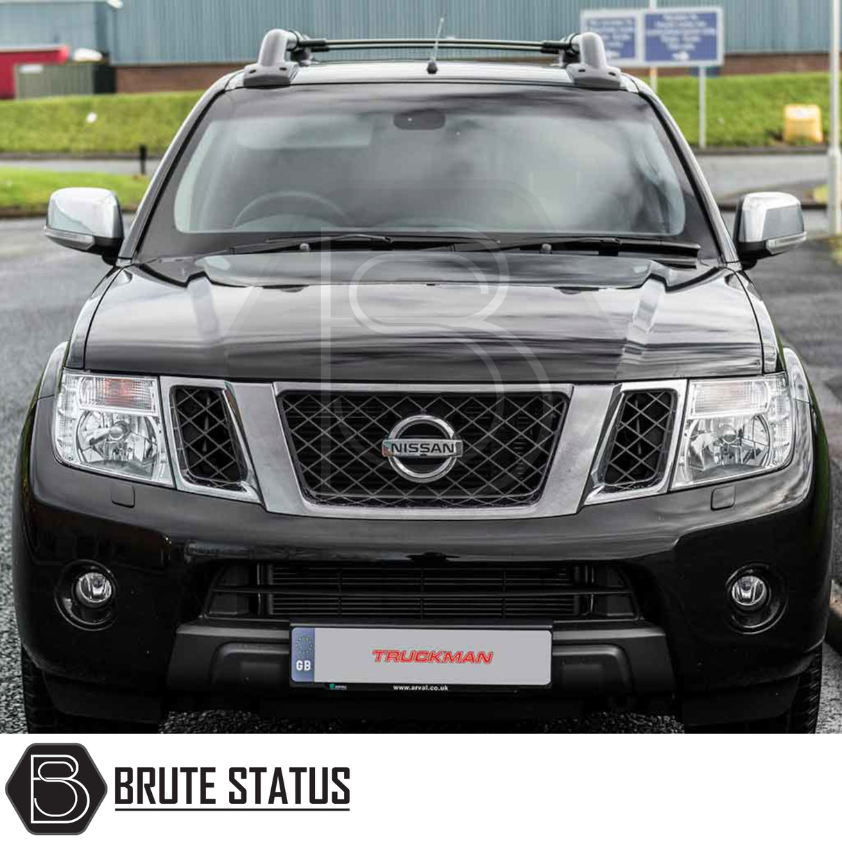 Nissan Navara 2005-2015 D40 Truckman Grand Hardtop Canopy with remote locking, featuring a chrome-accented grille and TRUCKMAN front plate, enhancing storage and security.