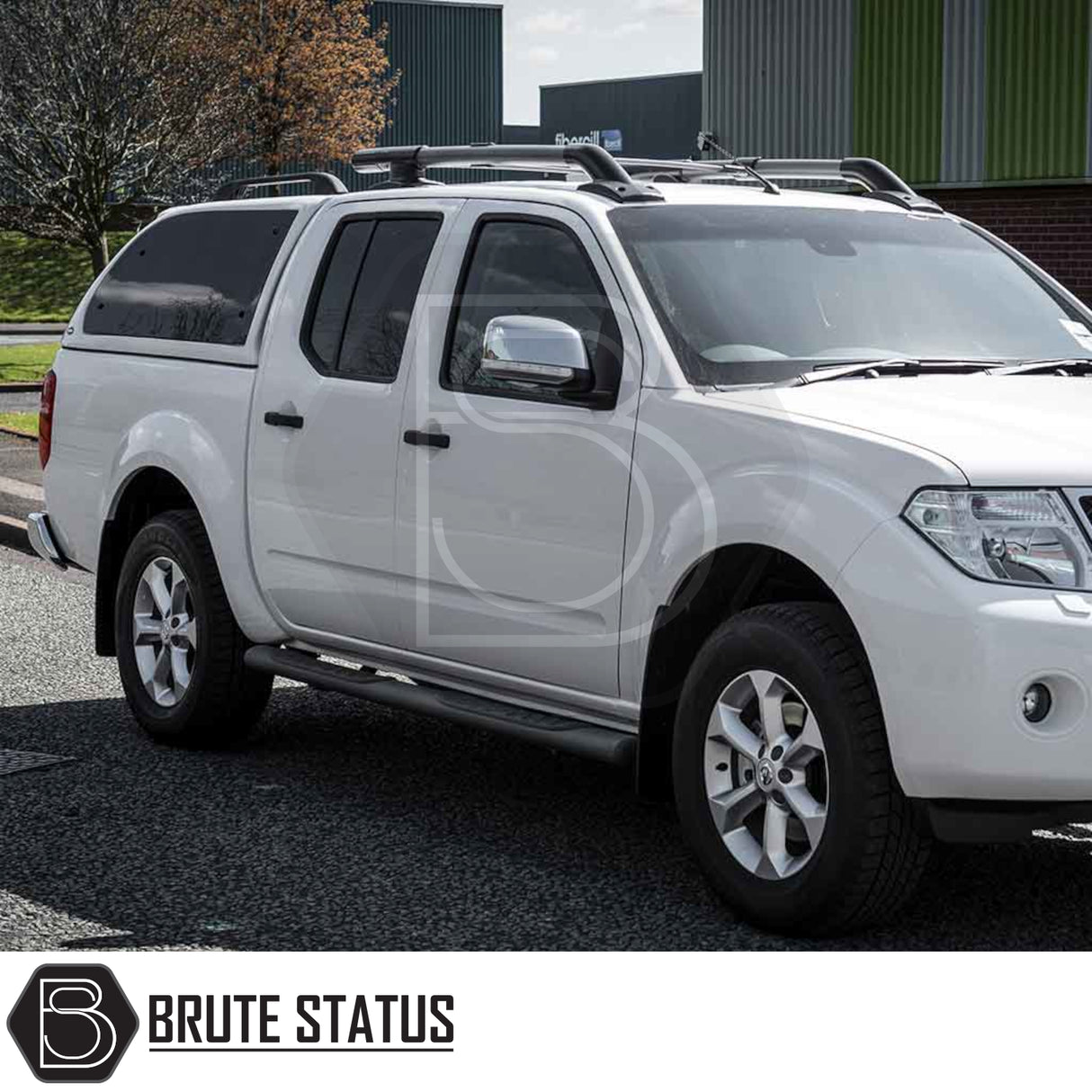 Nissan Navara 2005-2015 D40 Truckman Grand Hardtop Canopy with remote locking, featuring pop-out tinted windows and roof-rack cross-bars, enhancing functionality and style.