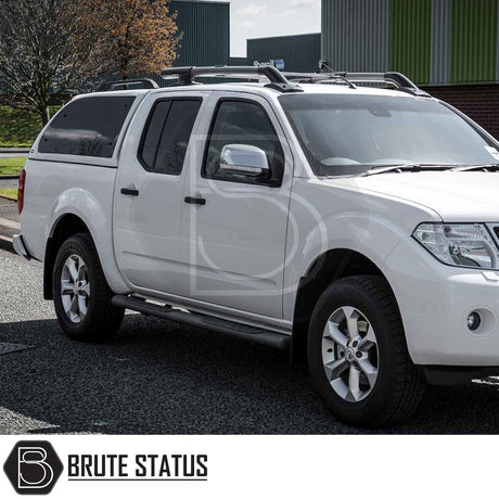 Nissan Navara 2005-2015 D40 Truckman Grand Hardtop Canopy with remote locking, featuring pop-out tinted windows and roof-rack cross-bars, enhancing functionality and style.
