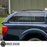 Nissan Navara D40 Truckman Grand Hardtop Canopy featuring tinted window, roof rails, and remote locking for enhanced security and style.