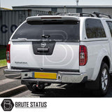 Nissan Navara 2005-2015 D40 Truckman Grand Hardtop Canopy with remote locking, featuring a cab-high design, tinted rear window, and chrome bumper with integrated tow hitch.