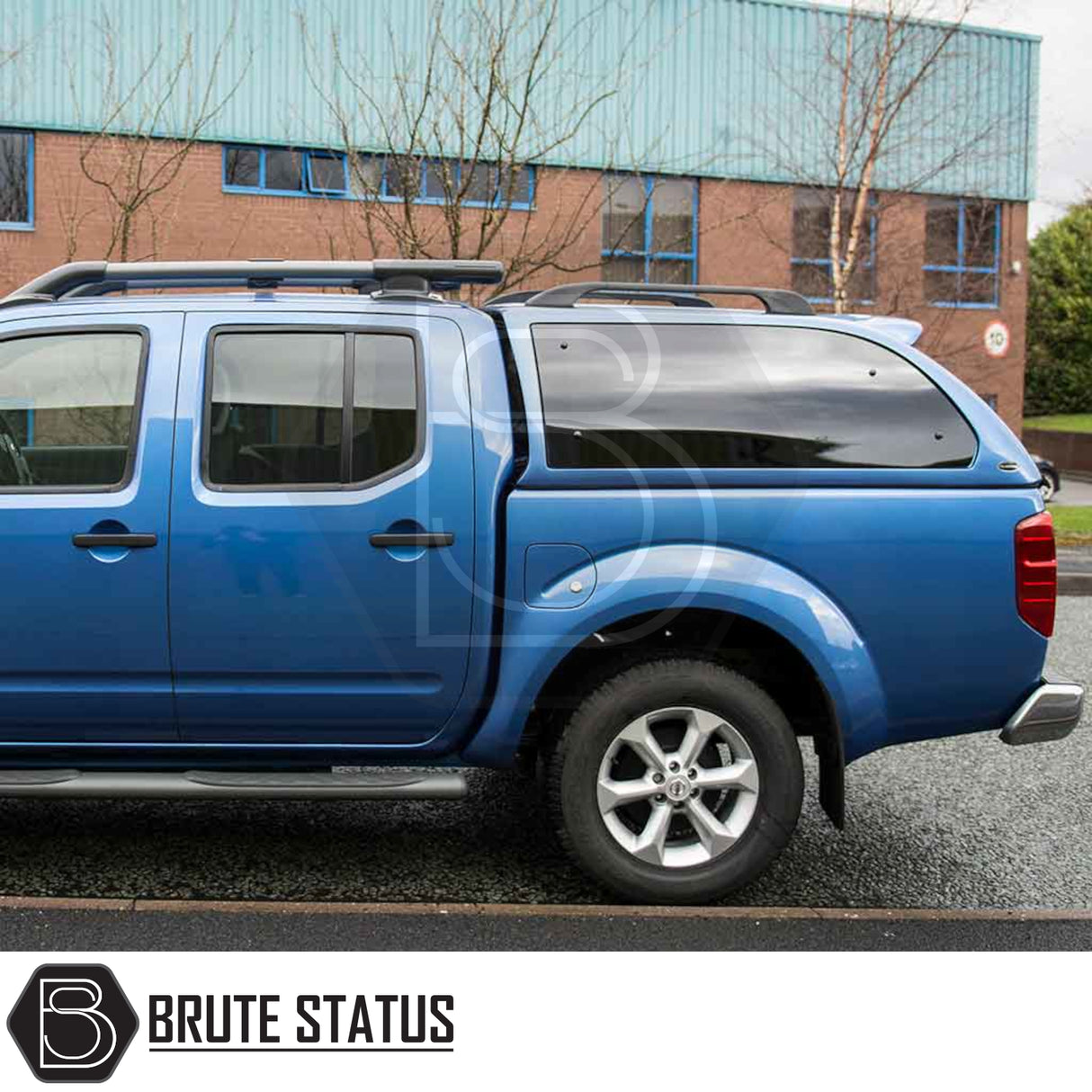 Nissan Navara D40 Truckman Grand Hardtop Canopy with remote locking, showcases aerodynamic design, tinted windows, and increased storage capacity, enhancing vehicle functionality and security.