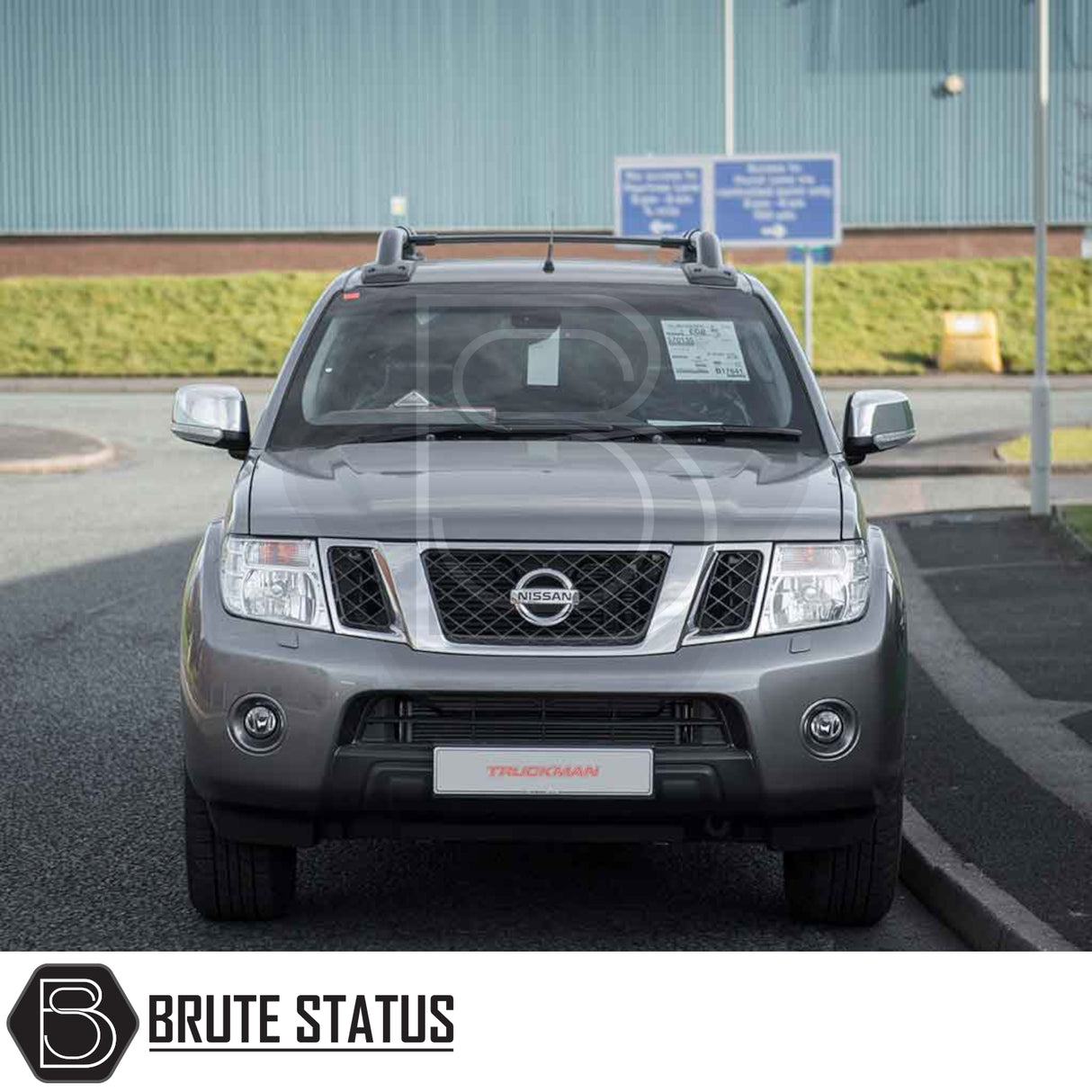 Nissan Navara 2005-2015 D40 with Truckman Grand Hardtop Canopy, featuring roof rails, fog lamps, and remote locking, enhancing style and functionality.