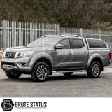 Nissan Navara 2005-2015 D40 Truckman Grand Hardtop Canopy with remote locking, featuring tinted windows and pop-out ventilation, enhancing pickup's style and security.