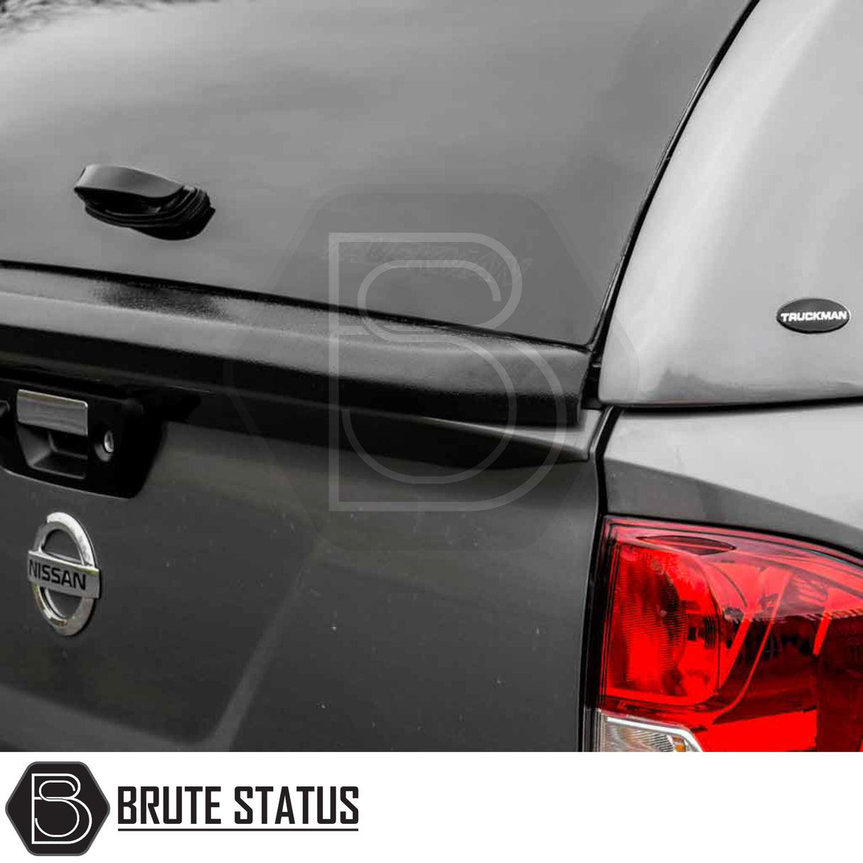 Nissan Navara D40 Truckman Grand Hardtop Canopy showcased on a pickup, highlighting its sleek fit and finish with remote locking feature.