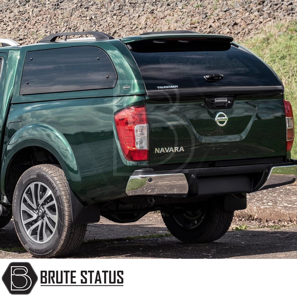 Rear view of a Nissan Navara 2005-2015 D40 fitted with a Truckman Grand Hardtop Canopy featuring tinted windows and chrome bumper.