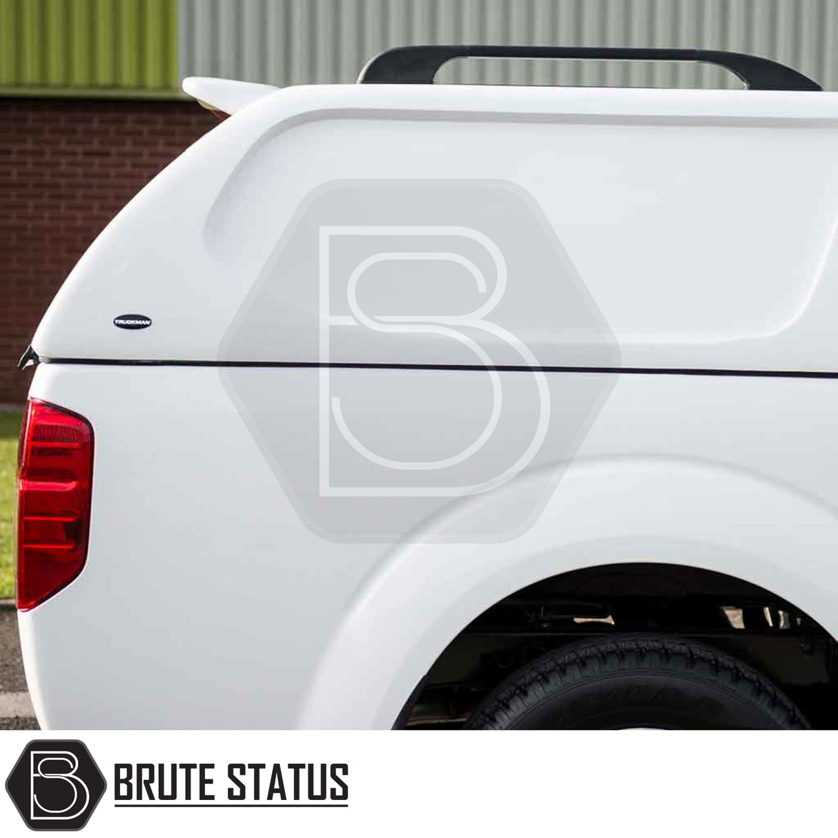Nissan Navara 2005-2015 D40 Truckman L-Series Hardtop Canopy with remote locking, featuring a cab-high design and solid sides, shown on a white pickup truck.