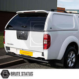 Rear view of a Nissan Navara with a Truckman L-Series Hardtop Canopy, featuring remote locking, tinted rear hatch, and solid sides for enhanced security.