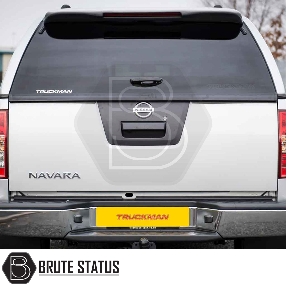 Nissan Navara 2005-2015 D40 with black Truckman L-Series Hardtop Canopy, featuring secure design, remote locking, and tinted glass for enhanced utility and style.