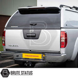 Nissan Navara 2005-2015 D40 Truckman L-Series Hardtop Canopy with solid sides, tinted glass, and remote locking, enhancing security and storage on a silver pickup.
