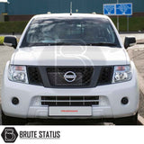 Front view of a white Nissan Navara with Truckman L-Series Hardtop Canopy, showcasing enhanced security and sleek design, ideal for increased storage and convenience.