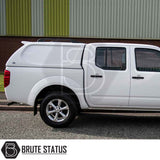 White Nissan Navara 2005-2015 with Truckman L-Series hardtop canopy by Brute Status, featuring remote locking and solid sides for enhanced security and style.