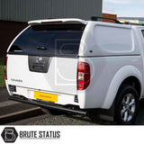 White Nissan Navara D40 with Truckman L-Series canopy, featuring remote locking, solid sides, and a tinted rear window for enhanced security and style.