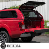 Red Nissan Navara 2015-2023 NP300 with Truckman GLS hardtop canopy, featuring open rear hatch and tailgate, showcasing the enhanced cargo space and sleek design.