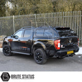 Nissan Navara with Truckman GLS canopy featuring tinted windows, remote locking, and vinyl-lined interior, enhancing vehicle storage and style.