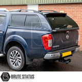 Nissan Navara 2015-2023 NP300 with Truckman GLS hardtop canopy featuring tinted windows, remote locking, and tow hitch, enhancing style and functionality for pickup enthusiasts.