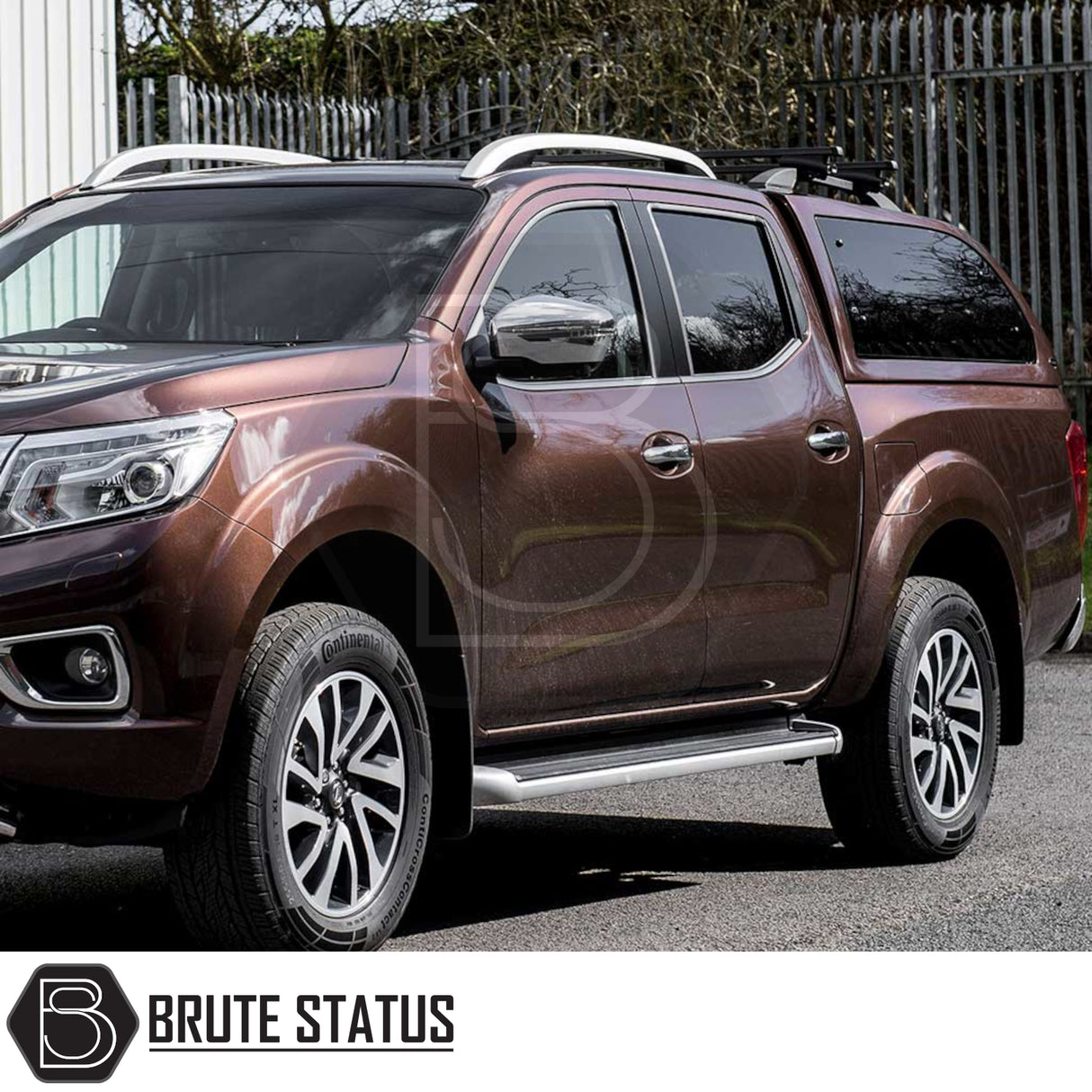 Nissan Navara 2015-2023 NP300 Truckman Grand hardtop canopy with remote locking, featuring tinted windows and alloy wheels, by Brute Status.
