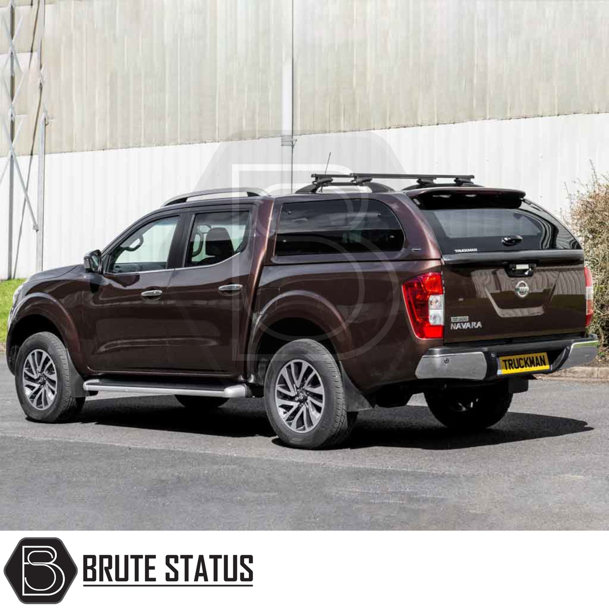 Nissan Navara 2015-2023 NP300 Truckman Grand Hardtop Canopy with remote locking, featuring a cab-high design and roof-rack bars for enhanced functionality and style.