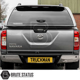 Nissan Navara 2015-2023 NP300 Truckman Grand Hardtop Canopy with remote locking, features tinted windows, enclosed cargo space, and streamlined design.