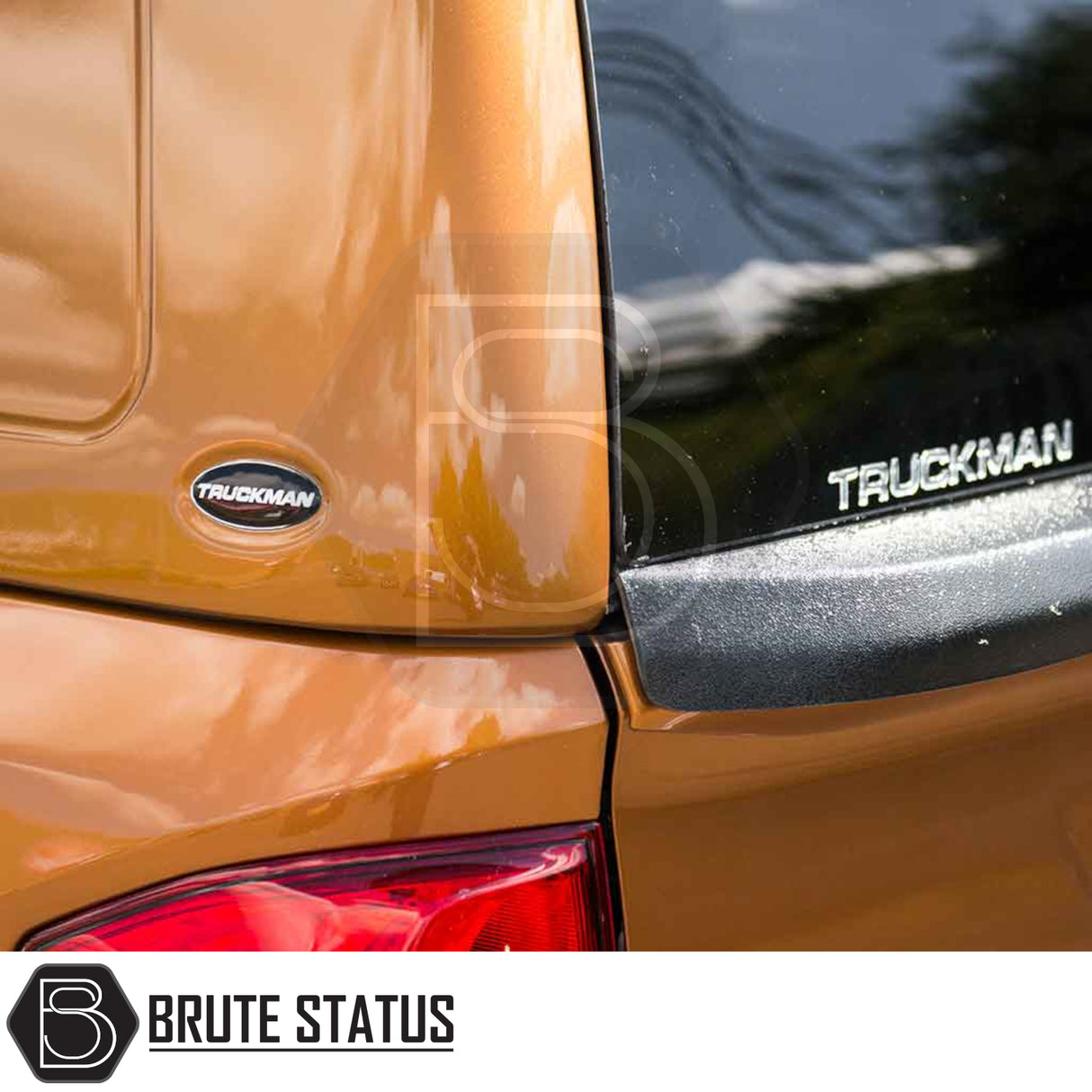 Close-up of Nissan Navara 2015-2023 NP300 Truckman RS Hardtop Canopy, showcasing “TRUCKMAN” badge, tinted glass, and remote locking feature for enhanced security.
