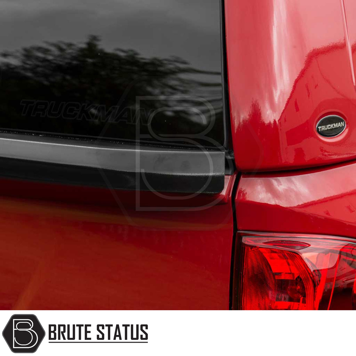 Close-up of Nissan Navara 2015-2023 NP300 Truckman RS Hardtop Canopy with tinted rear window, Truckman logo, and sleek design for secure, stylish truck customization.