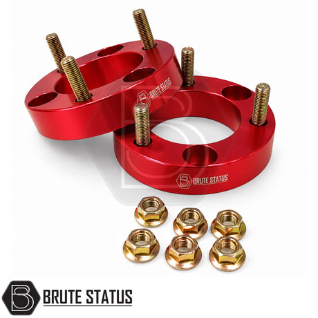 Nissan Navara front suspension lift kit 32mm anodised aluminium shock spacers designed to provide approximately 2 to 2.5 inch lift when paired with rear shackles