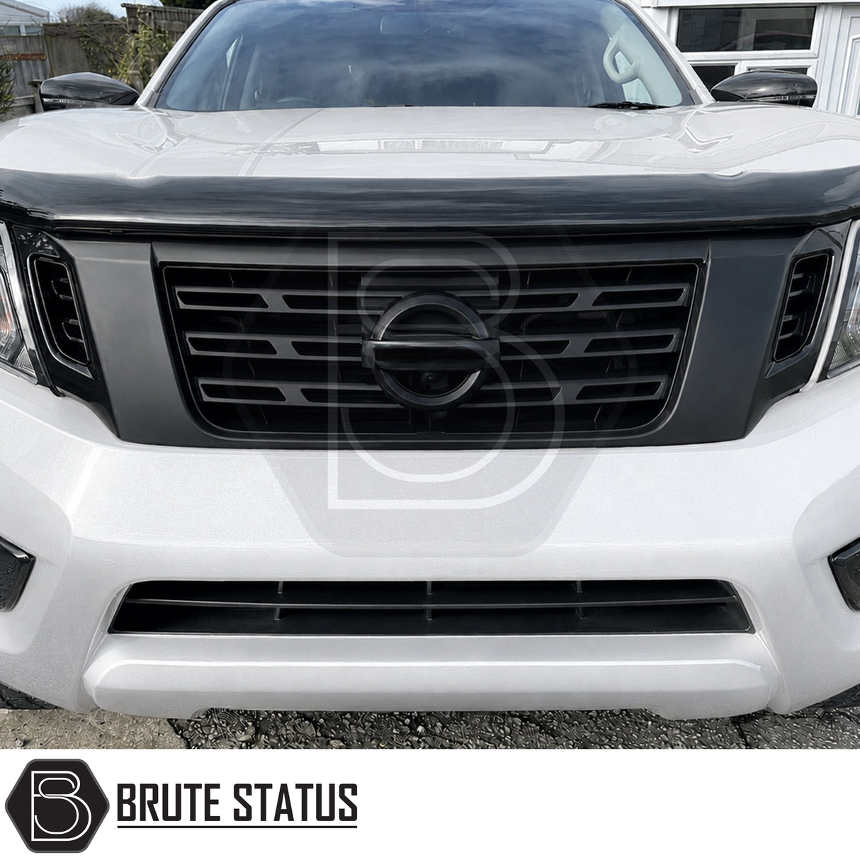 Front mounted matte black ABS plastic grille fitted to Nissan Navara pickup truck offroad 4x4 vehicle. Suitable for overlanding set ups and front mounting camera with adaption. Easy and straightforward installation. 